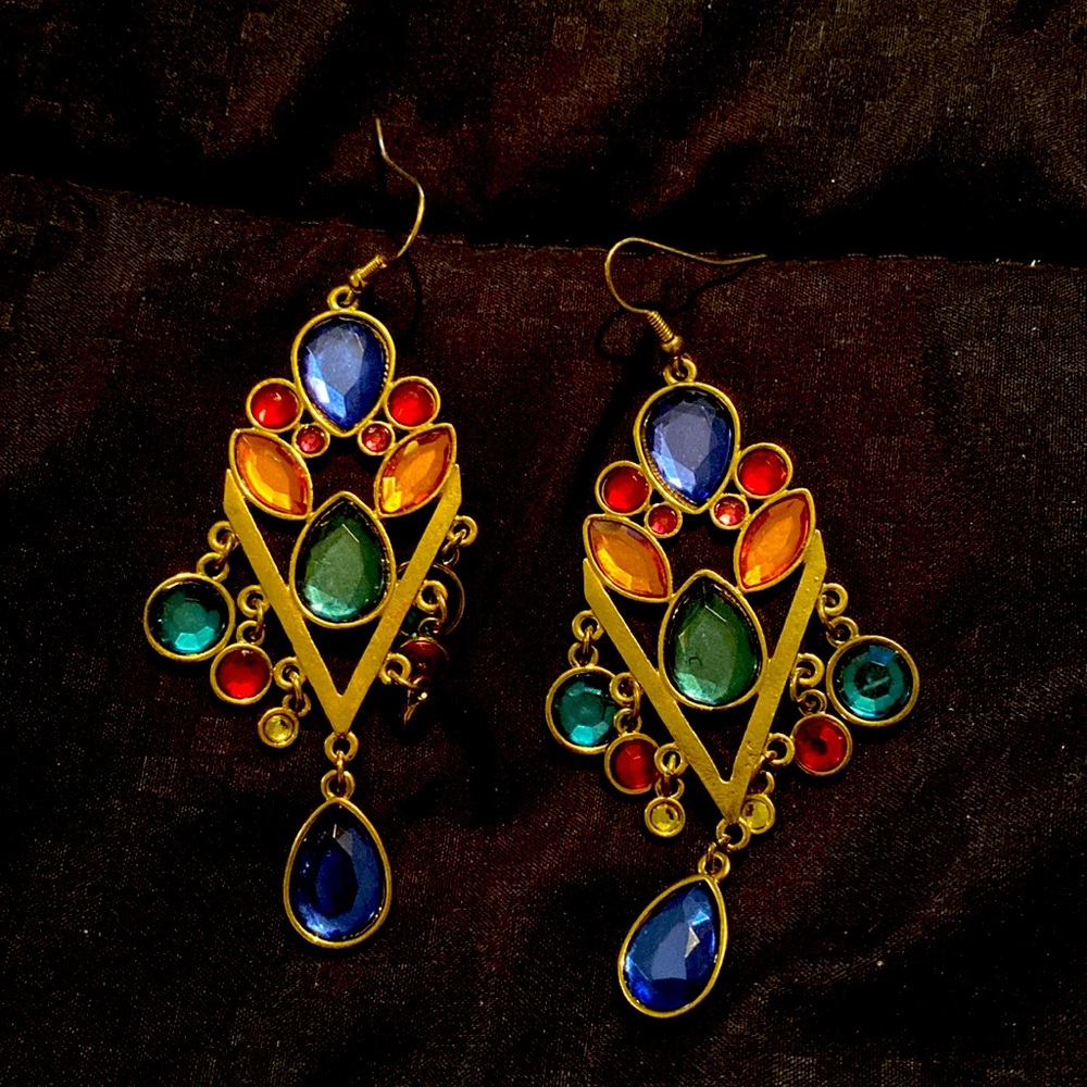 Like new. Multicolor stones. Surprisingly light.